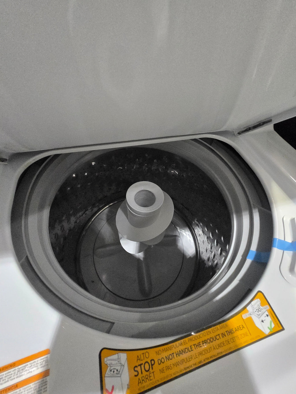 GE Gas Stacked Laundry Center with 3.8-cu ft Top load Washer and 5.9-cu ft Dryer White Model# GUD27GSSMWW