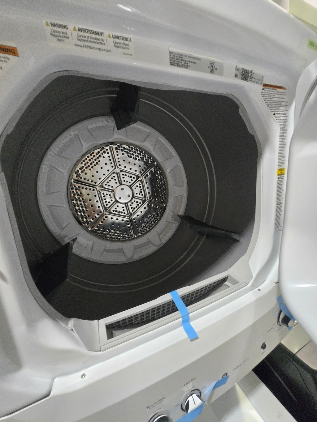 GE Gas Stacked Laundry Center with 3.8-cu ft Top load Washer and 5.9-cu ft Dryer White Model# GUD27GSSMWW