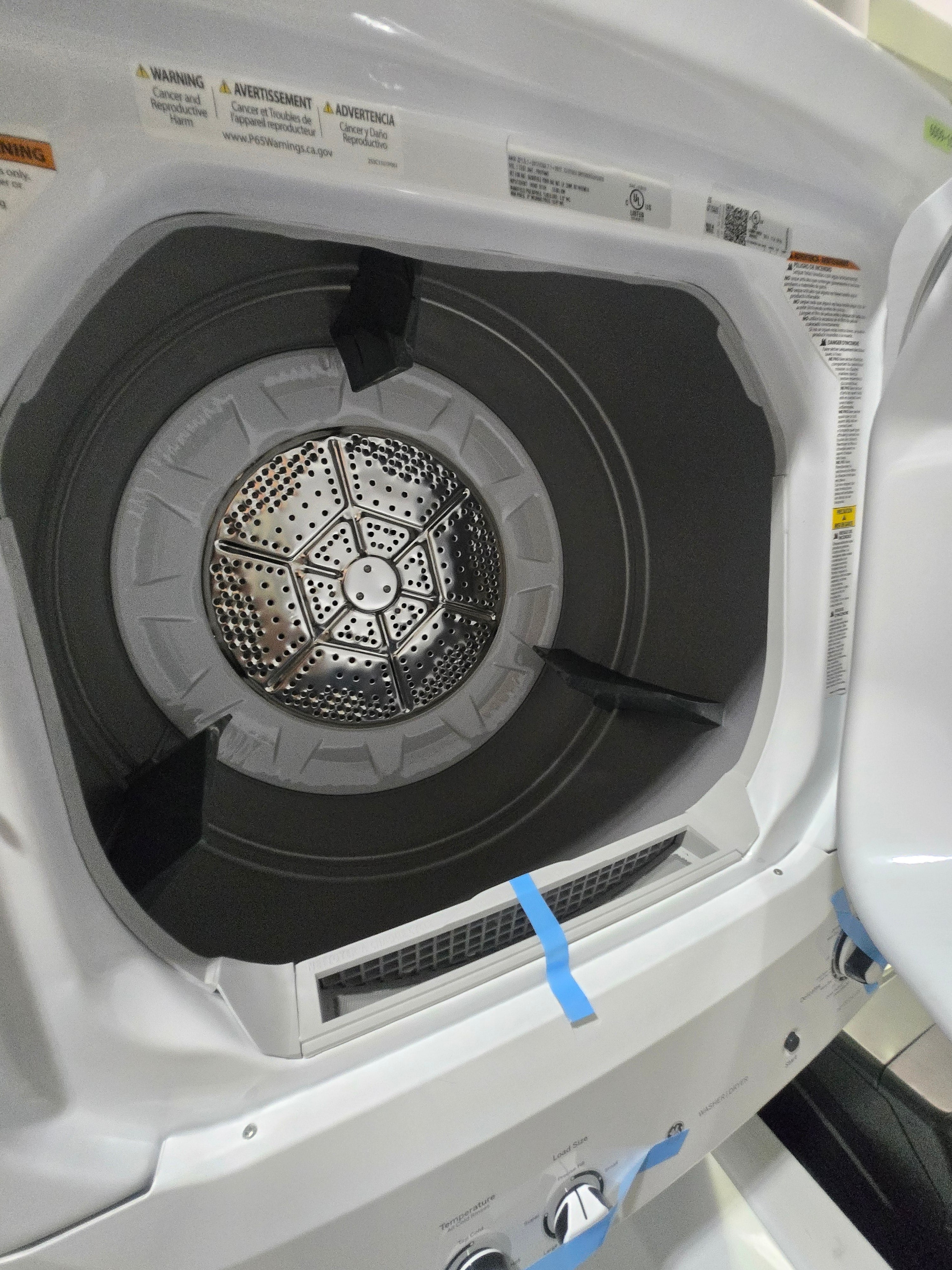 GE Gas Stacked Laundry Center with 3.8-cu ft Top load Washer and 5.9-cu ft Dryer White Model# GUD27GSSMWW